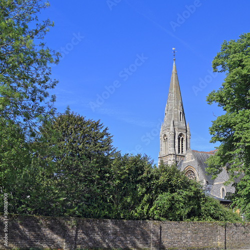 The spire of Hertford St Andrew Church stands tall and slim, Hertfordshire, England, UK.