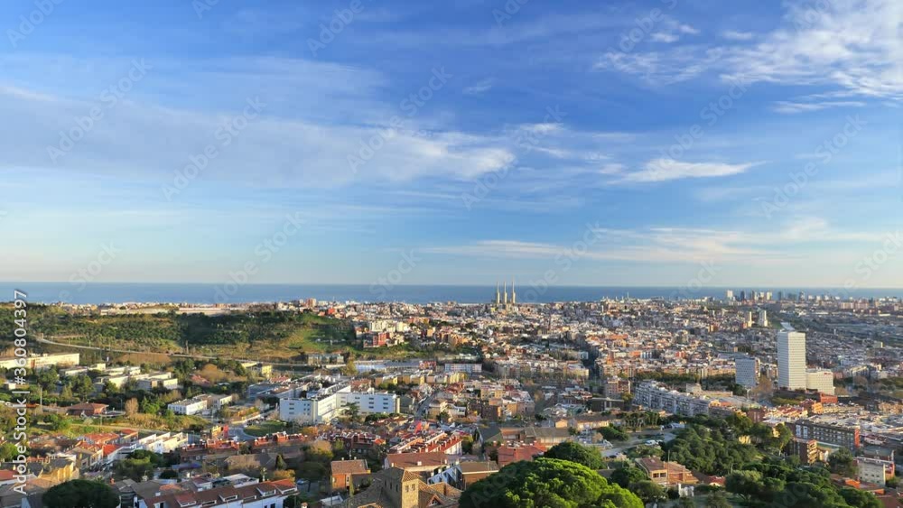 Time-lapse, floating clouds in sky over city, Barcelona, Spain. Urban skyline Time-lapse, floating clouds in sky over city, Barcelona, Spain. Urban skyline
