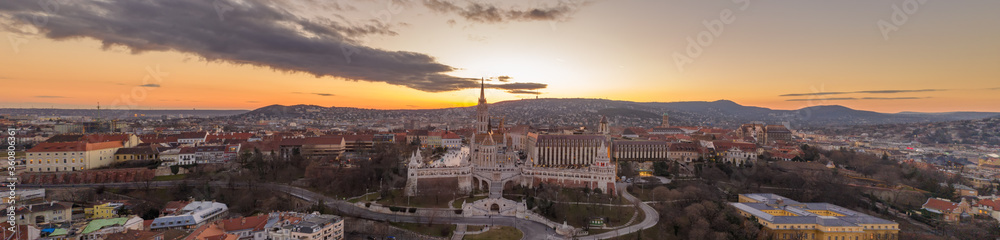 Aerial panorama drone shot of Fisherman's Bastion on Buda Hill in Budapest sunset time