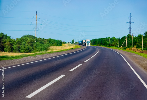 Federal highway, autobahn with cars and summer landscape