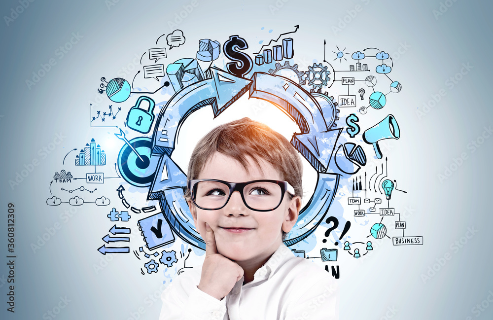 Thinking little boy in glasses, business plan Thinking little boy in glasses, business plan
