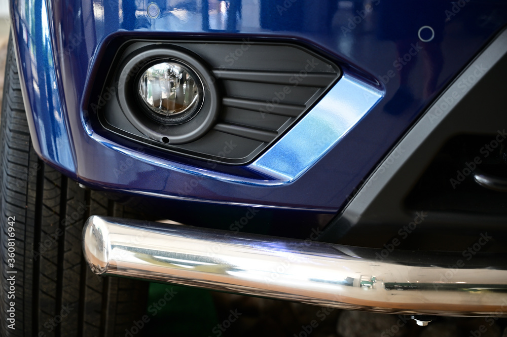 Photo of a car headlight. Lamp close-up