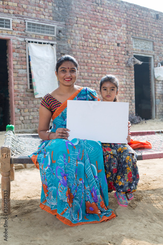 Photography Daughter and Mother holding white board