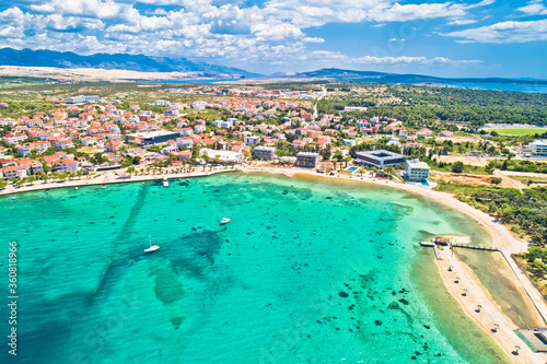 Town of Novalja beach and waterfront on Pag island aerial view © xbrchx