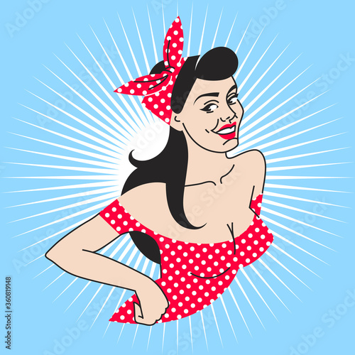 pin-up girl in a red dress and a white polka dots scarf on blue background. portrait young brunette with deep neckline, red lipstick in retro style.