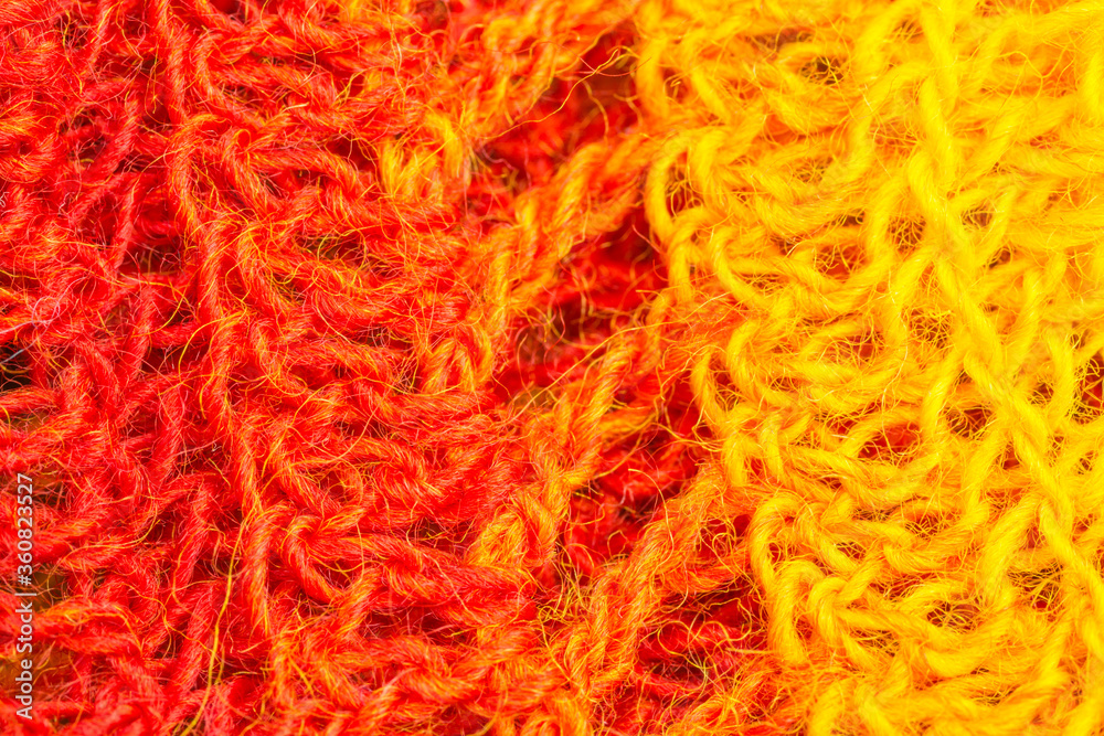 Fototapeta premium handmade multicolor crochet background with double crochet stitches, triple crochet stitches and chain stiches