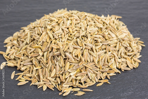 heap of cumin seeds - cuminum cyminum photo