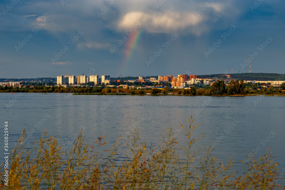 View of Irkutsk city in Russia with rainbow and river in the morning