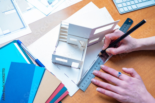 An architect creates a hous...