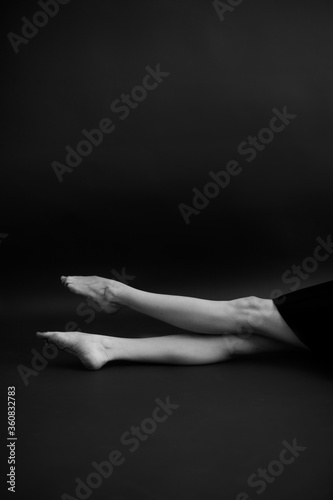 Details of body of beautiful girl, fashion and art, authentic black and white photo shoot