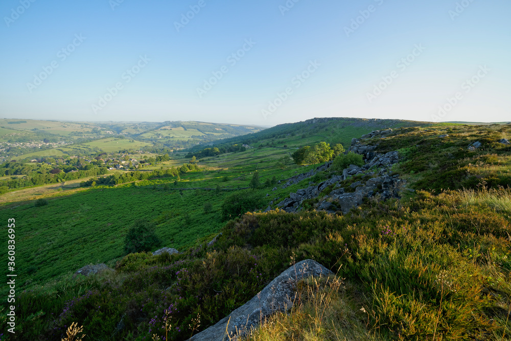 Naklejka premium Looking from Baslow Edge across to Curbar Edge on a bright, hazy summer morning