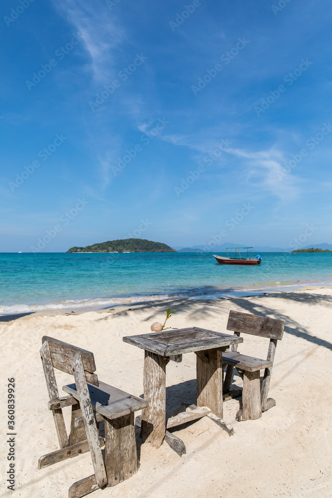 Beach Umbrella and Sunbed, Koh Mak Beach, Koh Mak island, Thailand. Beach Umbrella and Sunbed, Koh Mak Beach, Koh Mak island, Thailand.