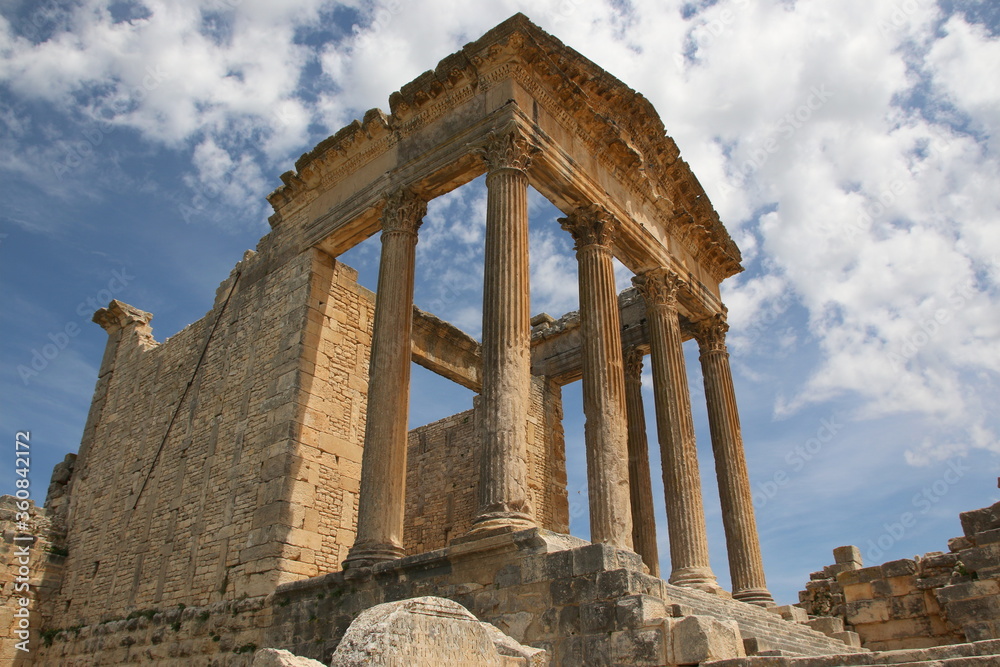 The remains and ruins of the Roman city of Dougga with the Capitol in Tunisia. 