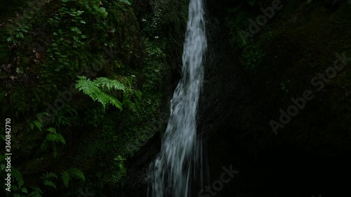 small waterfall in the ehrbachklamm gorge on the mosel in germany in the hunsrück mountains photo