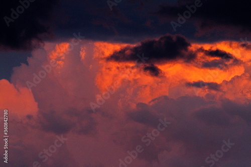 Colorful cloud patterns with golden hour light.