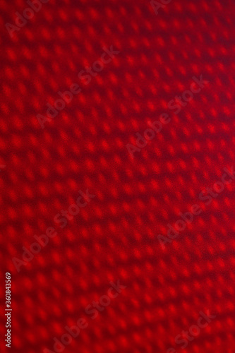 Blurred background. Technological abstract background in red. Vertical photo