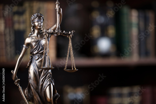 Justice concept. Themis statue in jugde office. © zolnierek