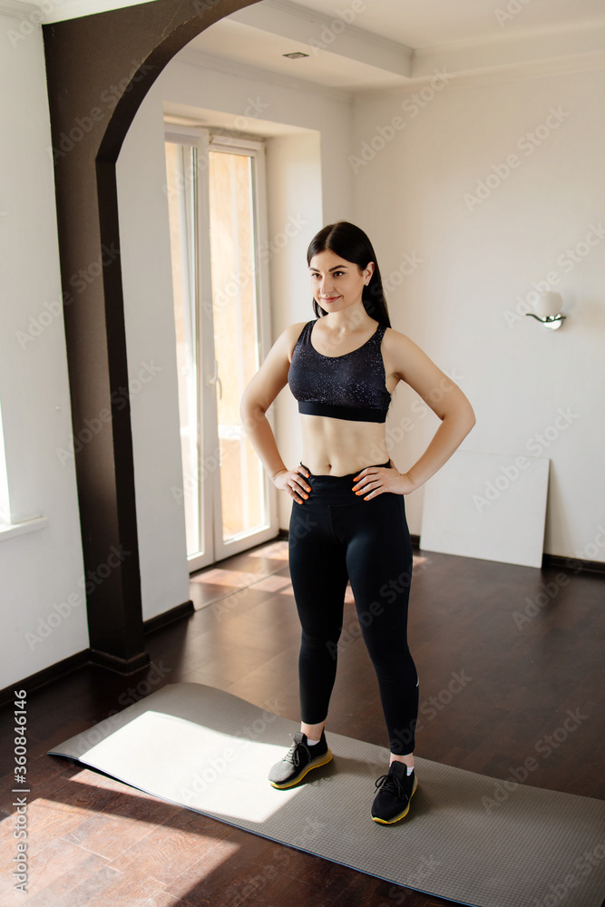Obraz premium Fitness, sport and active lifestyle. Motivation. Fit perfect body of sporty woman
