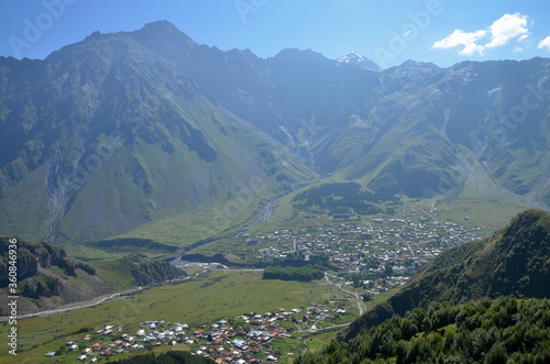 View at Gergeti village and Stepantsminda village. Georgia, Caucasus.