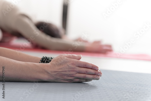 Wallpaper Mural Close-up of feminine and masculine arms during meditation.  Shashankasana position. Rabbit Pose. Seguence of Surya namaskar. Greeting to the Sun. How to Keep Your Arms for a Kriya or Meditation.. Torontodigital.ca