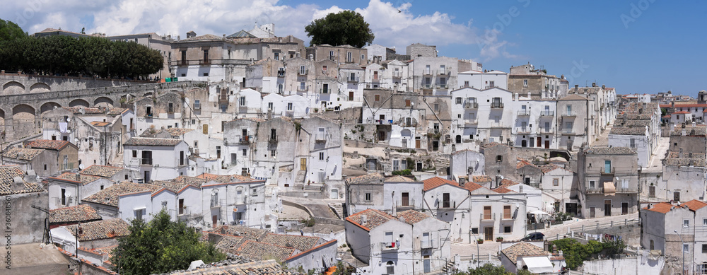 Panoramic view of Monte Sant'Angelo on Mount Gargano with white houses in Italy. Widescreen photo