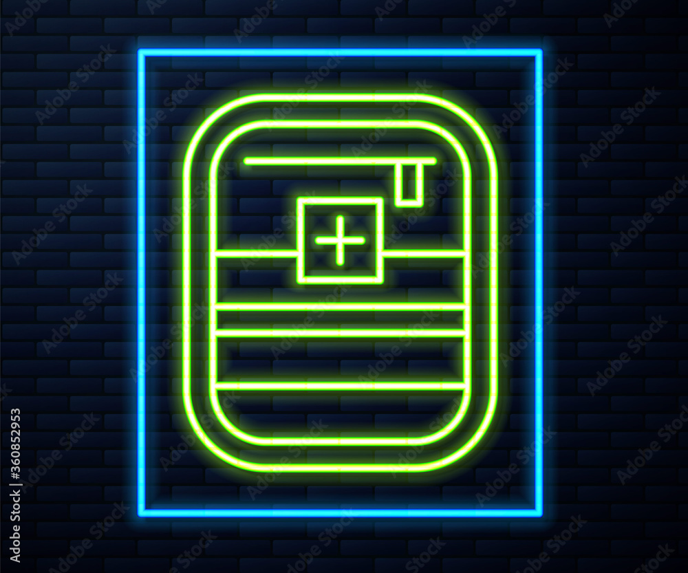 Glowing neon line First aid kit icon isolated on brick wall background. Medical box with cross. Medical equipment for emergency. Healthcare concept.  Vector Illustration