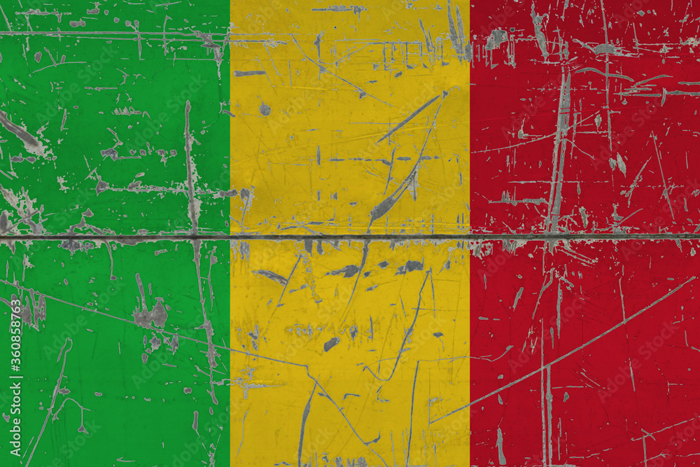 Mali flag painted on cracked dirty surface. National pattern on vintage style surface. Scratched and weathered concept.