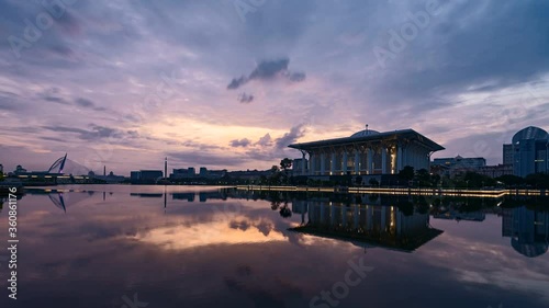 4K Dramatic sunrise timelapse during blue hour at the iron mosque or also known as Tuanku Mizan Zainal Abidin by the lake at Putrajaya, Malaysia.
H