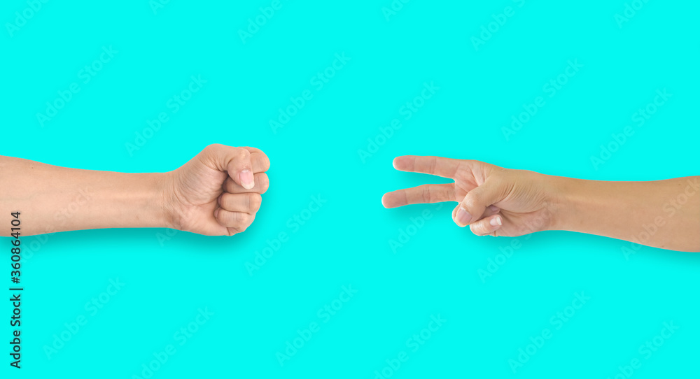 Two hands playing rock-paper-scissors on blue background