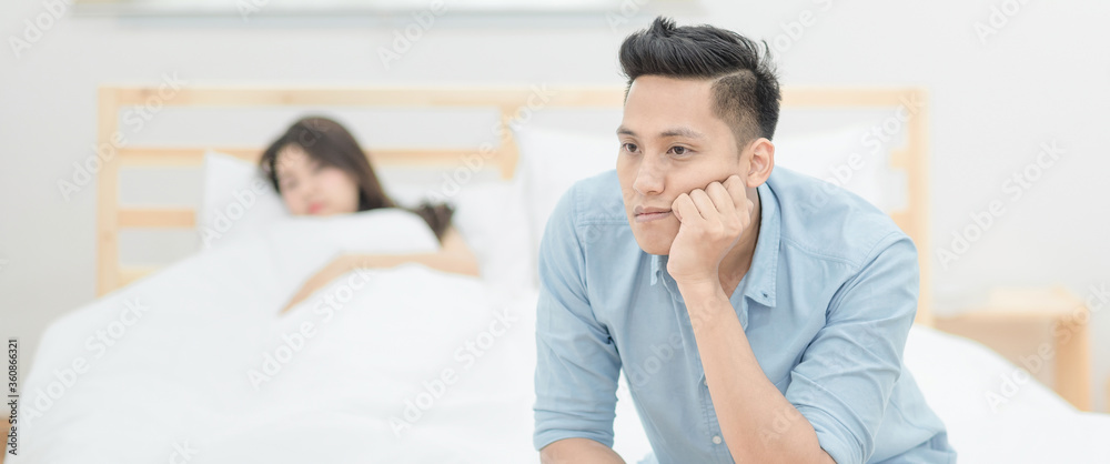 Young asian couple having argument and quarrelling with each other.Photo design for family problems and unhappy concept. Young asian couple having argument and quarrelling with each other.Photo design for family problems and unhappy concept.