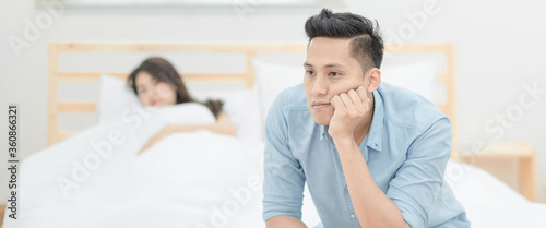 Young asian couple having argument and quarrelling with each other.Photo design for family problems and unhappy concept.