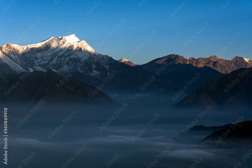 Nature view of Himalayan mountain range at Poon hill view point,Nepal. Poon hill is the famous view point in Gorepani village to see beautiful sunrise over Annapurna mountain range in Nepal.