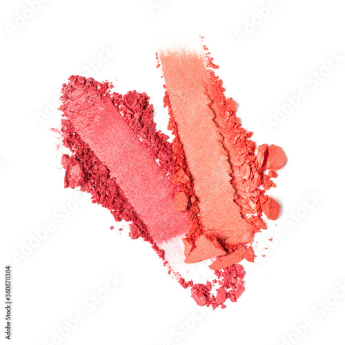 Close-up of make-up swatches. Smears of crushed red blusher