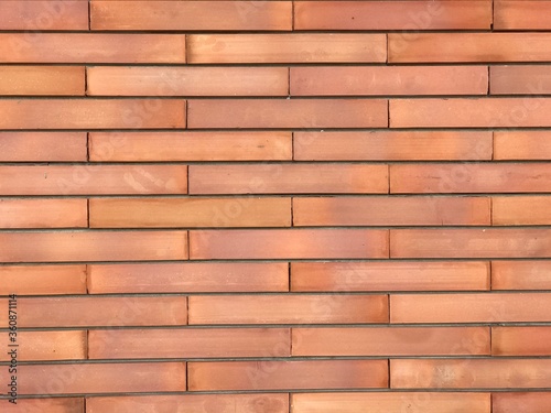 The red brick wall can be used as a background.