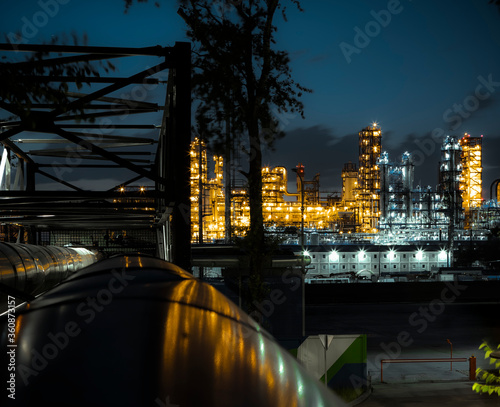 A look at the lights of the Moscow oil plant on a summer night.