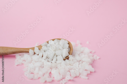 Sea salt in a wooden spoon ...