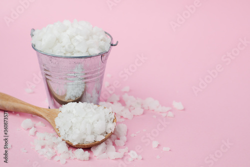 Sea salt in a wooden spoon ...