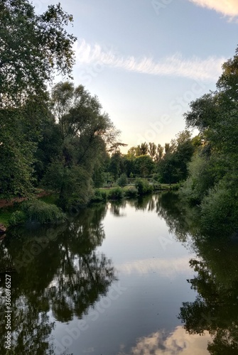 Beautiful park river with amazing light reflections