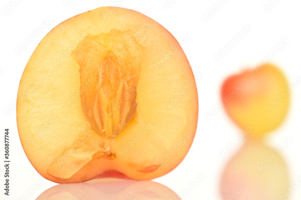 Yellow sweet cherry, close-up, on a white background.