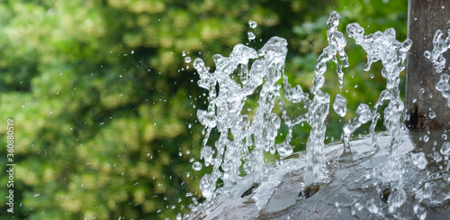 Konstfotografi Water gurgling from a street fountain