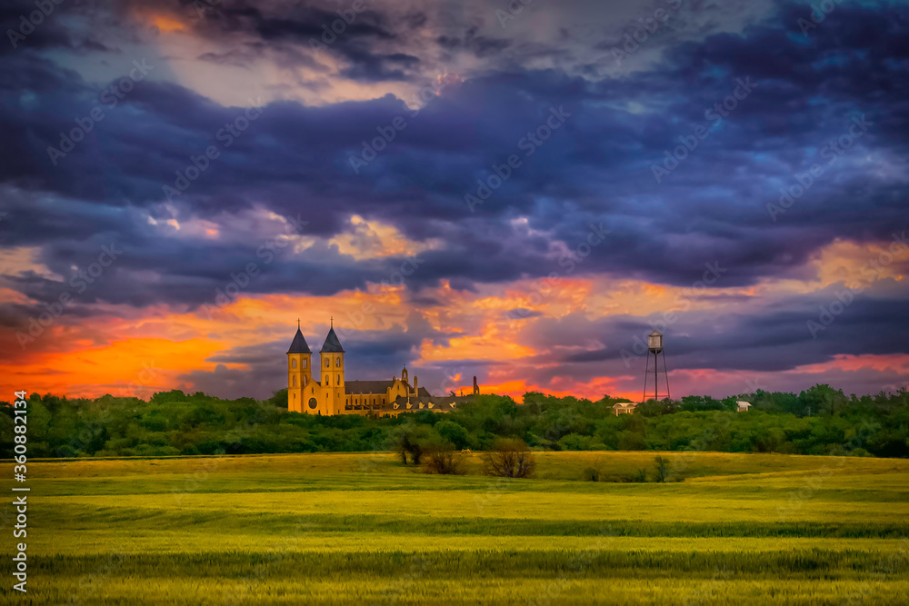 Victoria, KS USA - Panoramic View of Kansas Sunset Sky, Wheat Fields & the Cathedral of the Plains Victoria, KS USA - Panoramic View of Kansas Sunset Sky, Wheat Fields & the Cathedral of the Plains