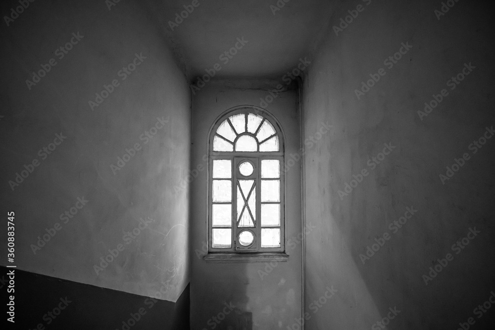 The window in staircase of the house was built in the Neo-Renaissance style in the early 1900s