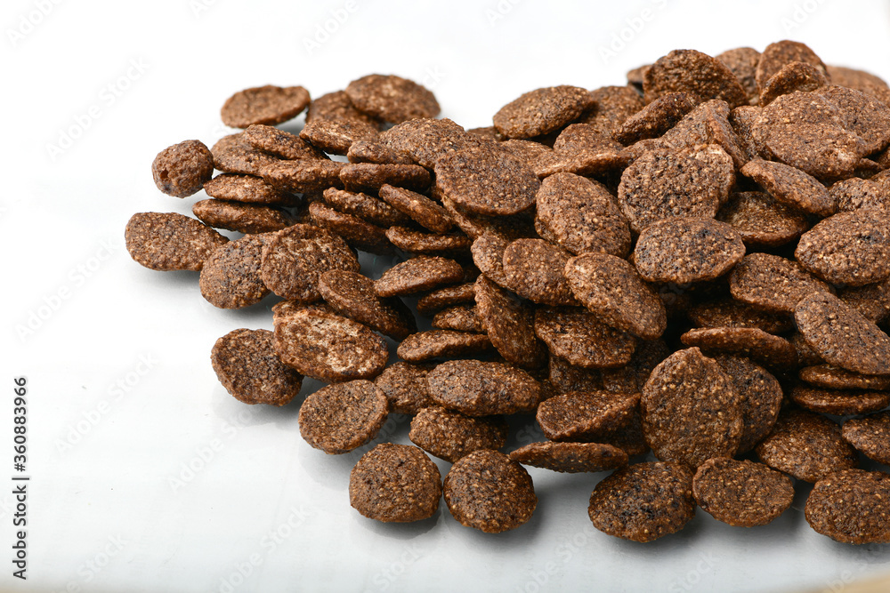 Breakfast cereal balls with chocolate on a white background Breakfast cereal balls with chocolate on a white background