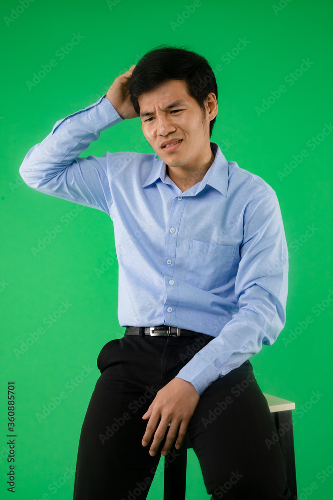 Businessman post action thinking about numb and doubt to learning course on website. Use for graphic with green screen and movie. Concept about consulting. Stock and banking concepts Businessman post action thinking about numb and doubt to learning course on website. Use for graphic with green screen and movie. Concept about consulting. Stock and banking concepts