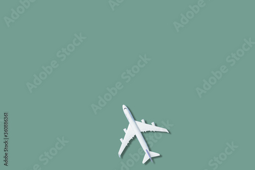 white airplane on a blue background, top view 3d rendering