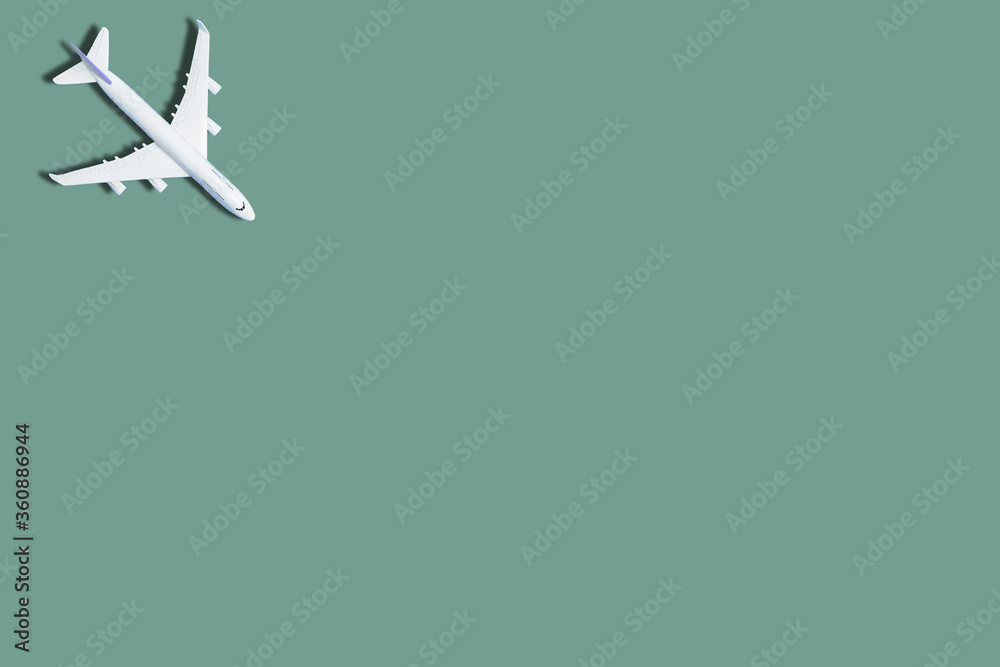Model plane,airplane on green color background. 3d rendering