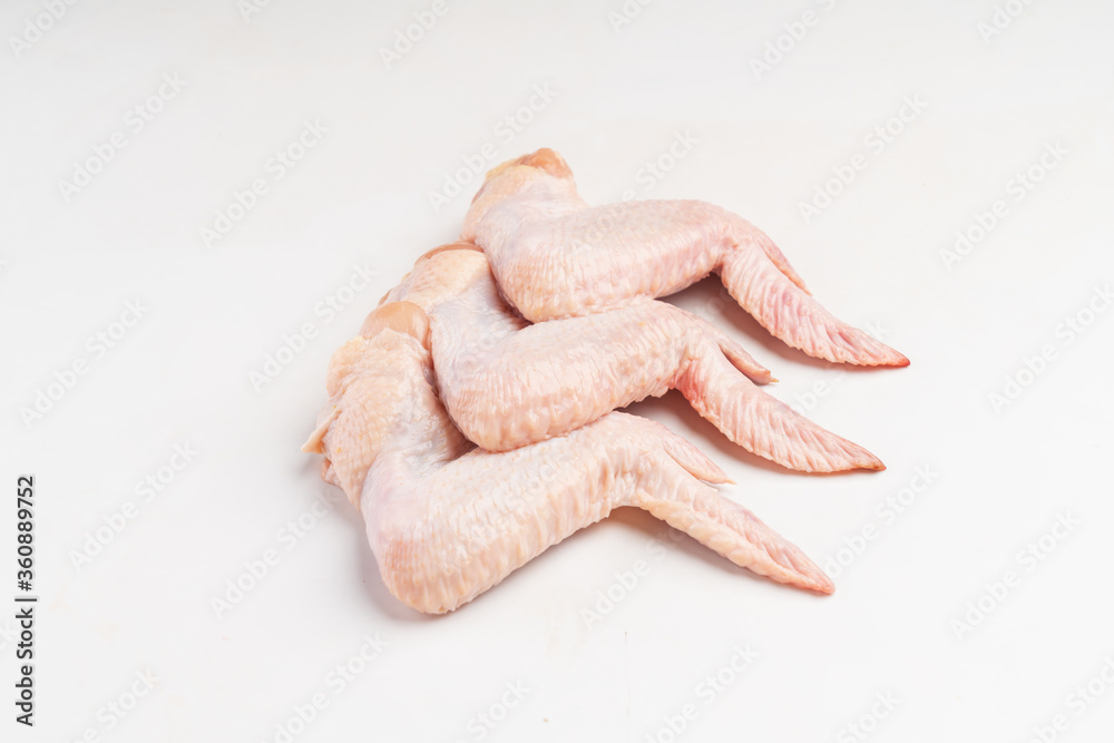 Fresh chicken wings on white background Fresh chicken wings on white background