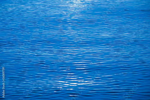 Ocean ripples waves as water texture background.