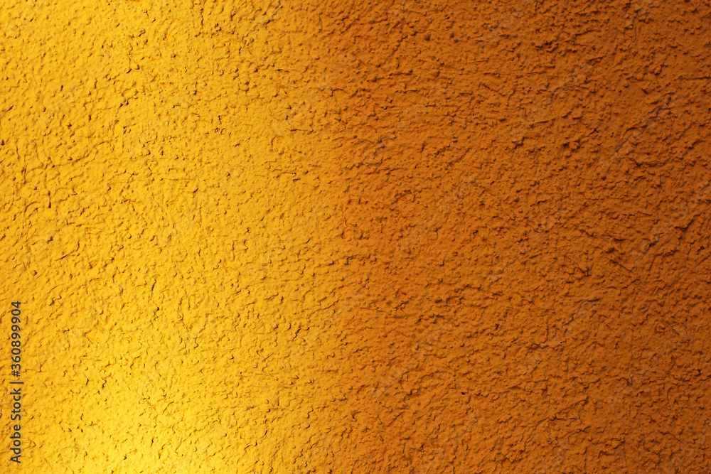 yellow stucco wall, the texture of a painted wall yellow stucco wall, the texture of a painted wall
