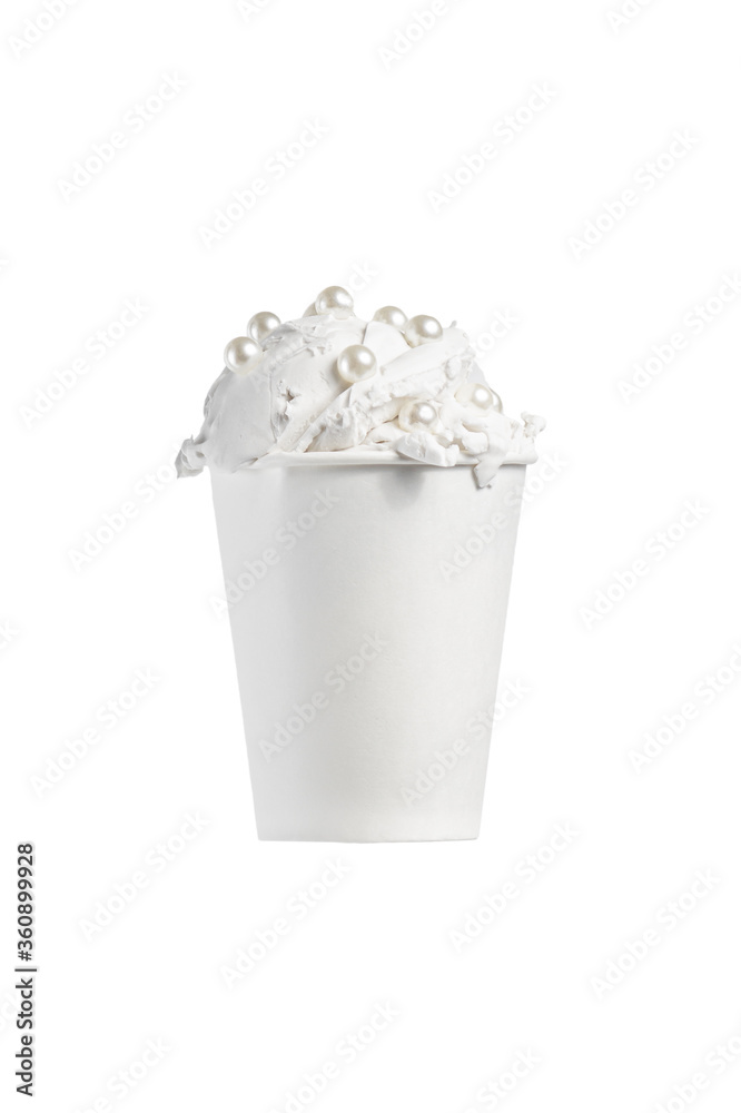 white ice-cream balls in a white paper cup with sweet pearls on a white background isolate. close up, copy space.